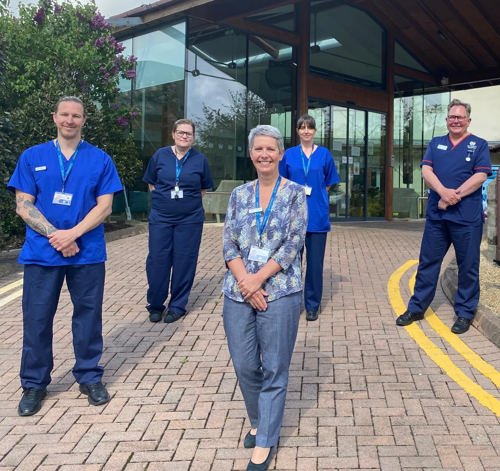 Some of our Hospice nurses with Chris Benson