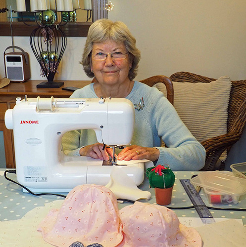 Liz sewing hats