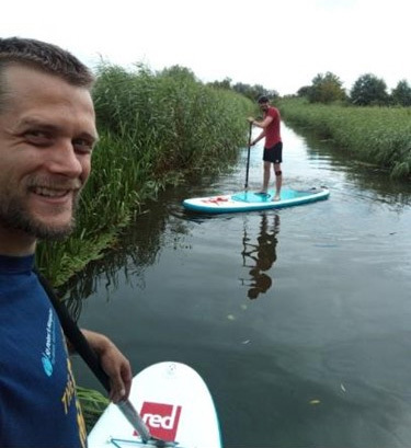 Iain on his paddle board